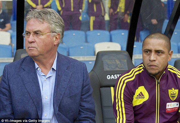 Big names: Guus Hiddink and Roberto Carlos have been enticed to Anzhi as manager and technical director respectively